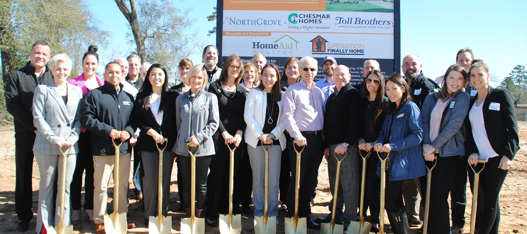 Chesmar employees smiling in group photo
